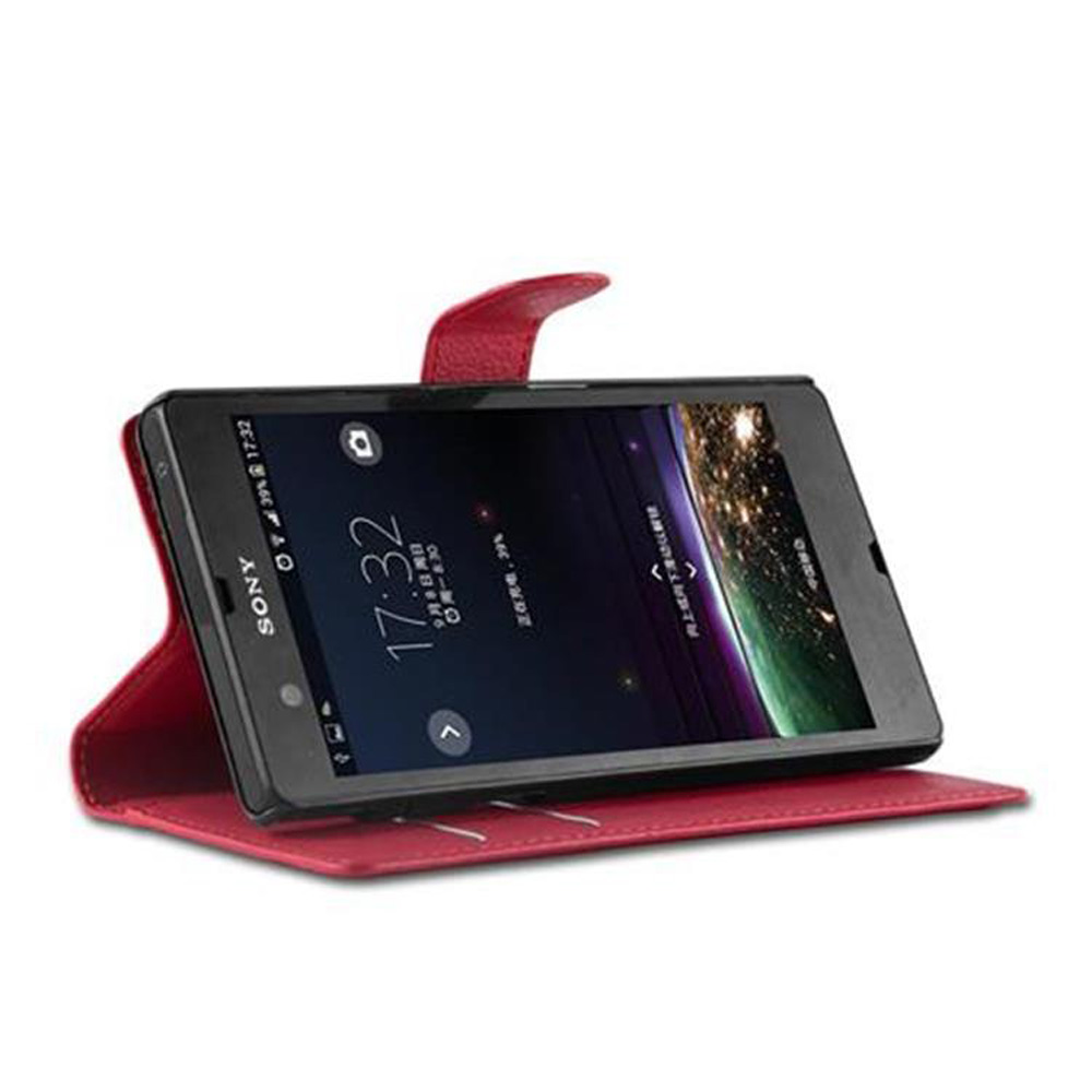 Ein Smartphone in einem roten Etui, das seinen Bildschirm mit Uhrzeit und App-Symbolen zeigt.