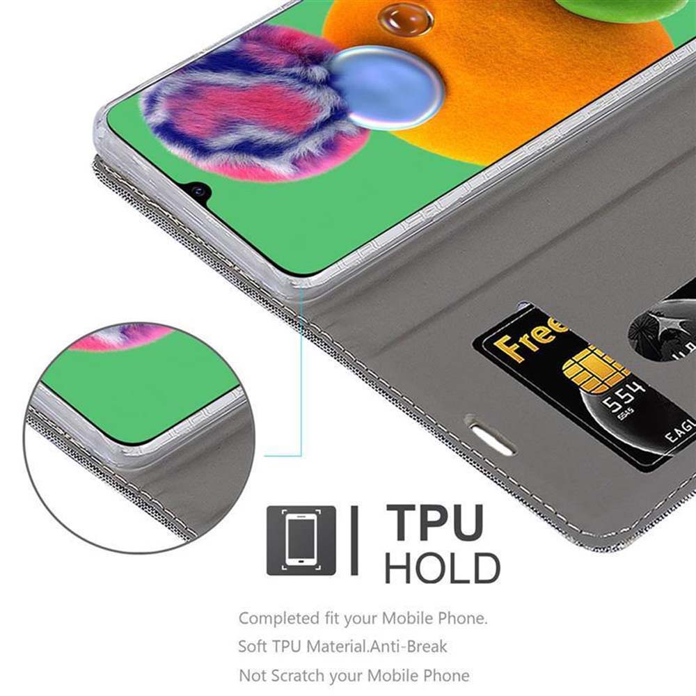 Custodia grigia per telefono con telefono, carta d'oro ed etichetta TPU HOLD.