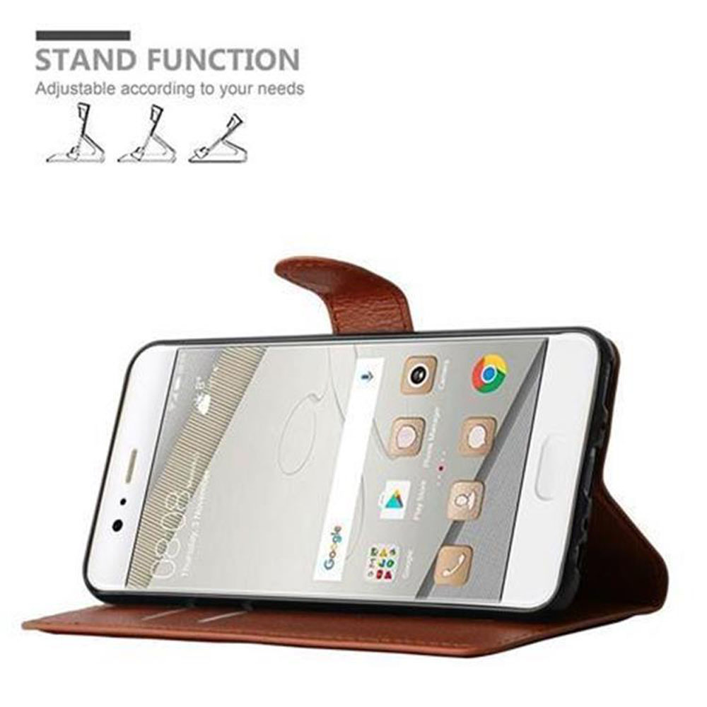 Ein Telefon in einer braunen Lederhülle, zum Betrachten aufgestellt. Der Text oben lautet: Standfunktion.