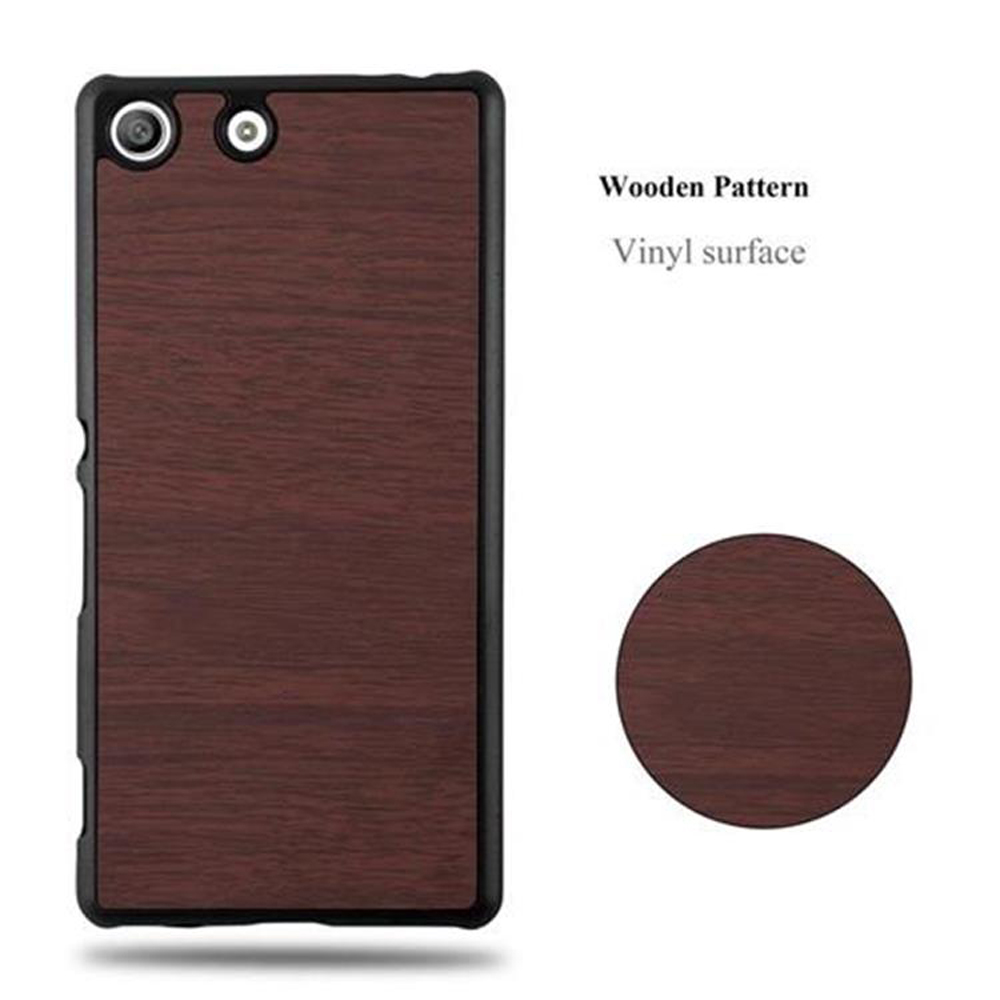 Funda de teléfono con diseño de madera. Se muestra una muestra redonda de patrón de madera.