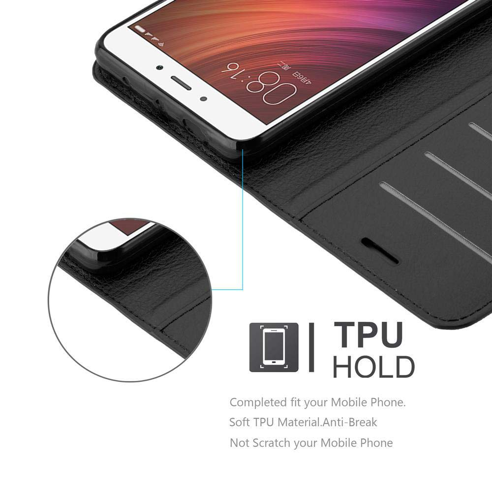 Ein schwarzes Telefon in einer schwarzen Hülle mit dem Text 'TPU HOLD'.
