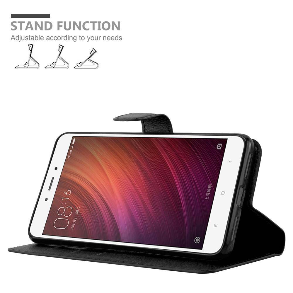 Eine schwarze Handyhülle mit Telefon, das einen rot-pinken Bildschirm zeigt. Text: 'Standfunktion'.