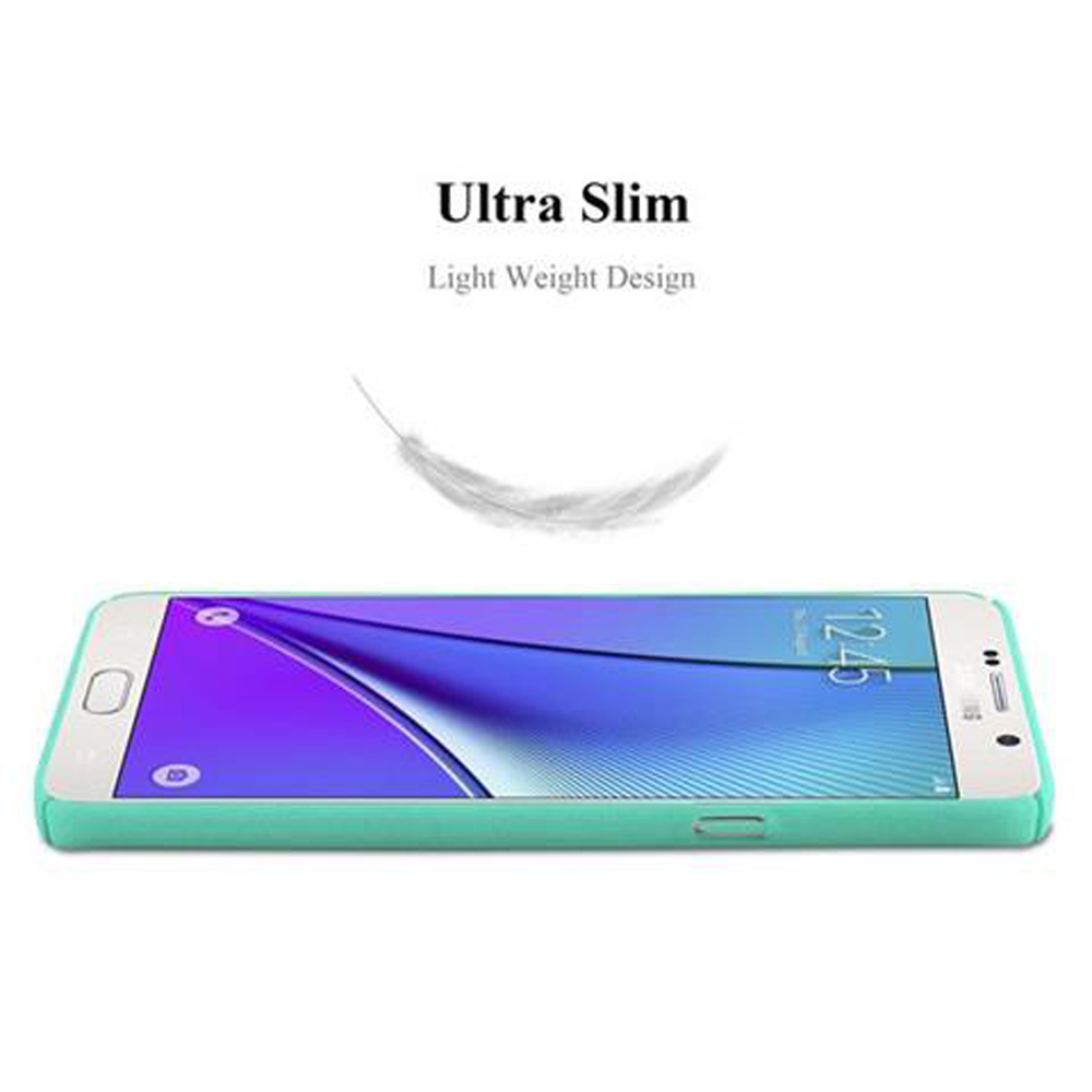 Ein grünes Telefon mit Uhr auf dem Bildschirm. Eine weiße Feder ist über dem Telefon.