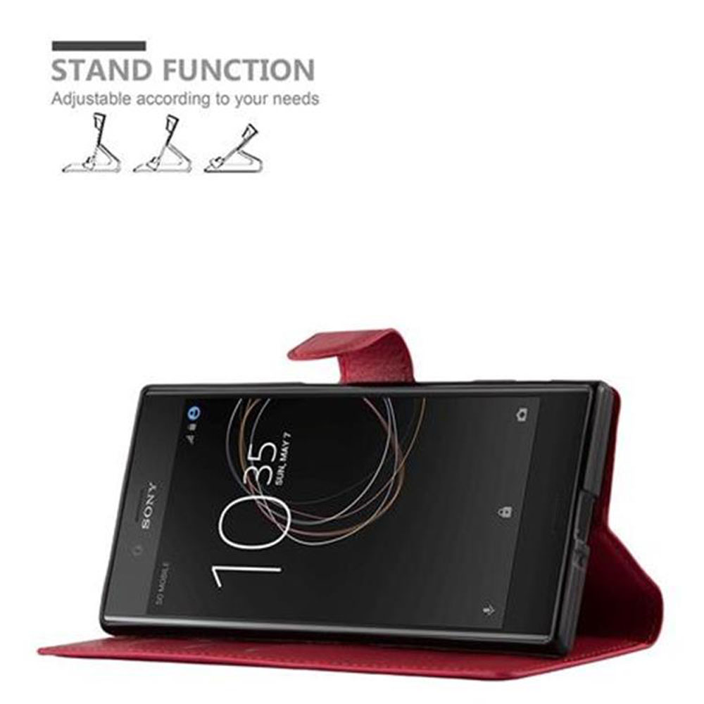 Custodia rossa, aperta. Telefono all'interno, schermo visibile. Funzione stand indicata da icone.