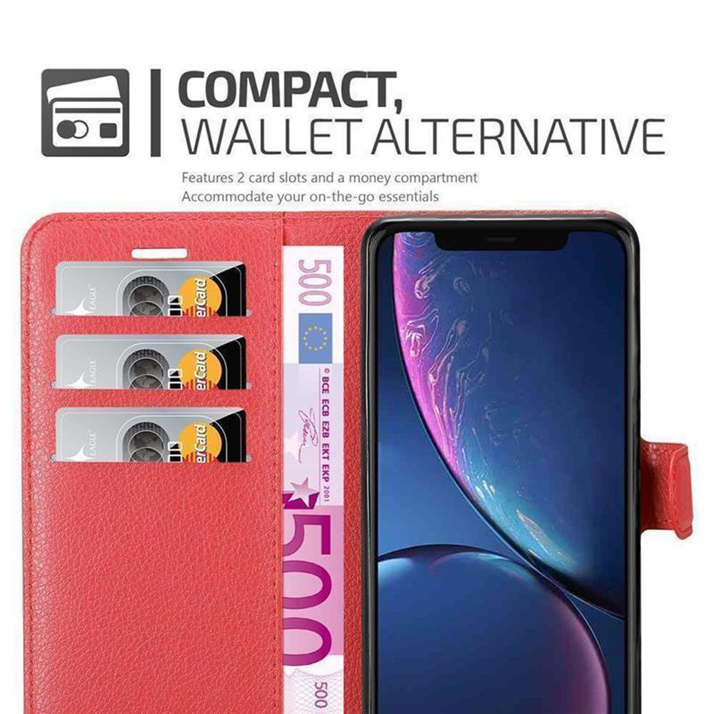 Custodia rossa per telefono con telefono, carte e denaro. Il telefono ha schermo rosso, custodia aperta.
