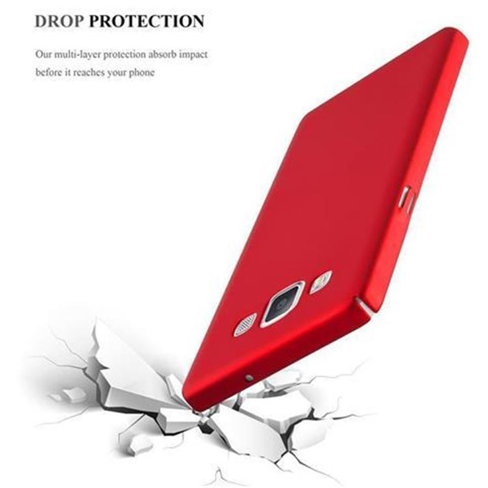 Una funda de teléfono roja cayendo. La funda está ligeramente inclinada con grietas en el suelo.