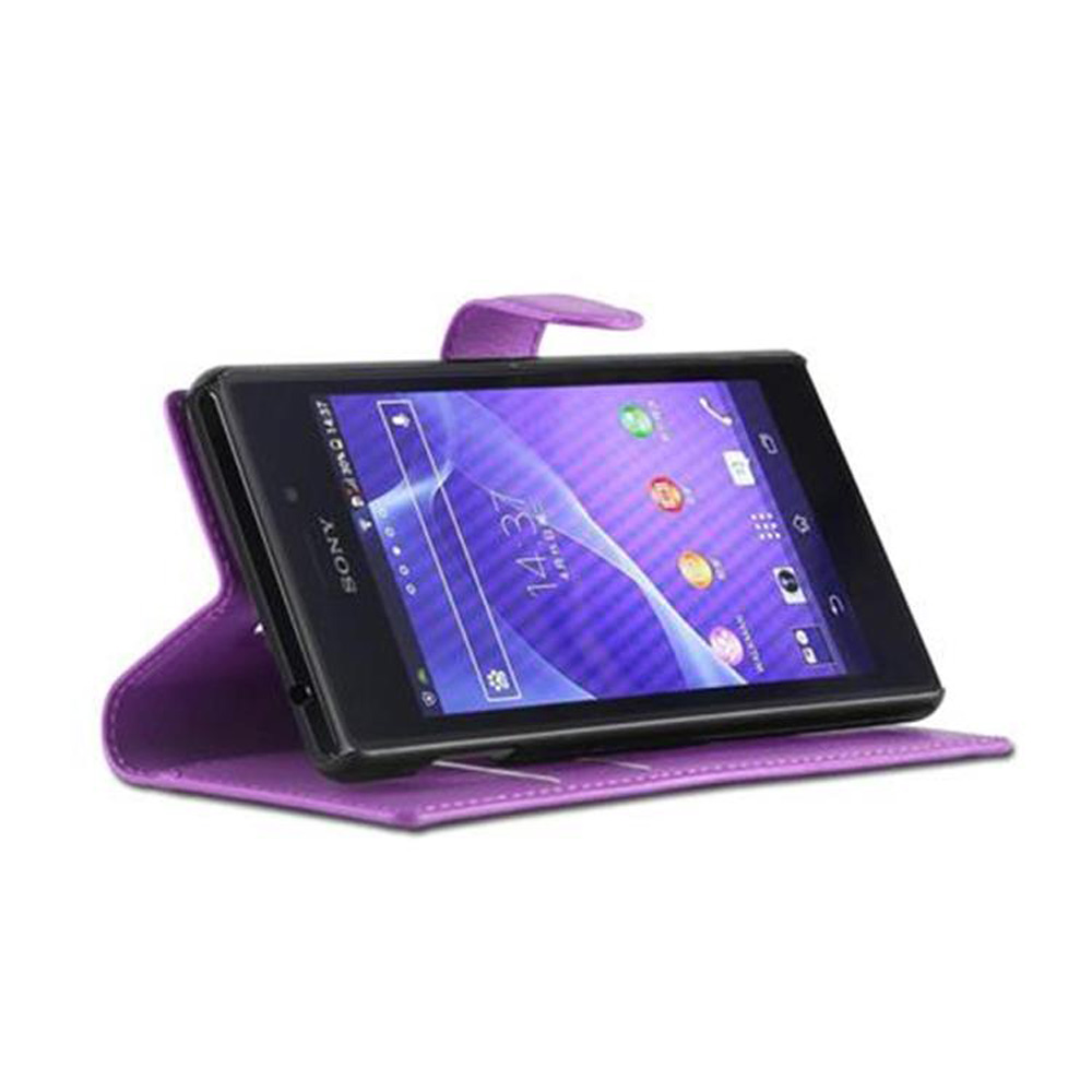 Un teléfono en una funda morada está abierto y de pie. La pantalla muestra un fondo morado.