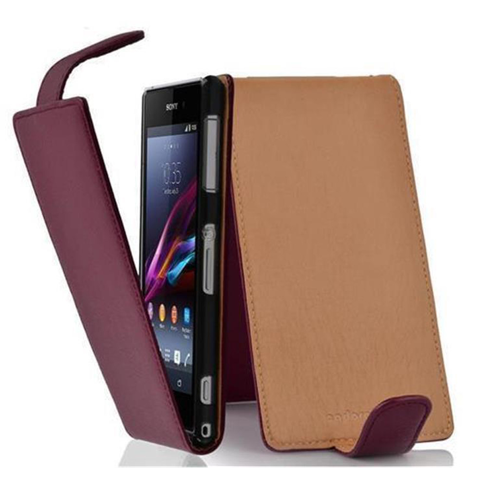 Telefono in una custodia, aperta, con un design bordeaux e beige. Il telefono è nero.