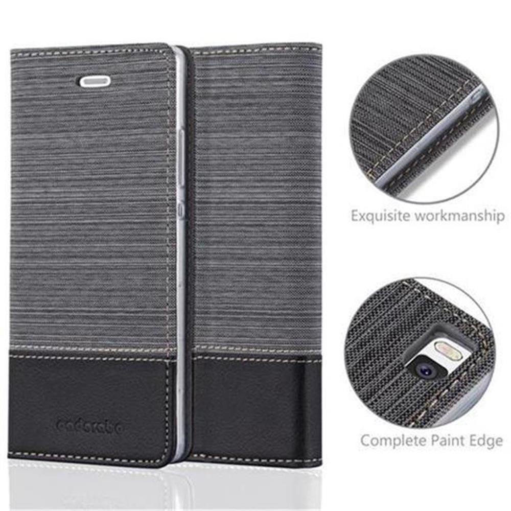 Funda gris para teléfono, abierta y cerrada. Base negra, cubierta gris texturizada. Detalles muestran costuras y recortes.