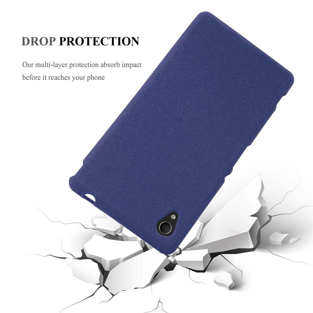 Una funda de teléfono azul con un teléfono, la funda rota en el suelo, con grietas alrededor.