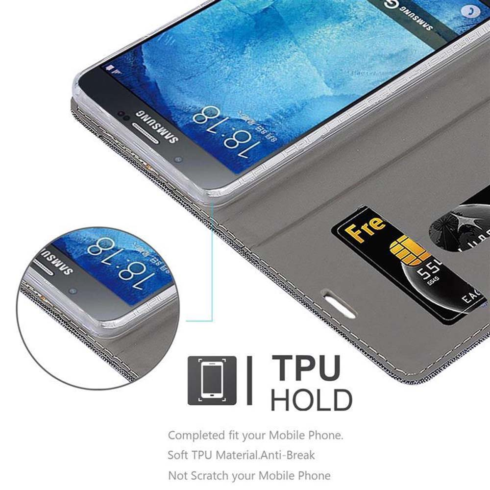 Telefono in custodia con carte di credito e testo 'TPU HOLD', primo piano.