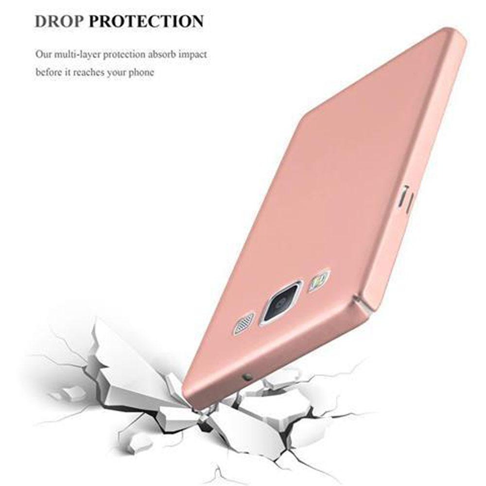 Una funda rosa para teléfono sobre una superficie agrietada. Se menciona protección contra caídas.