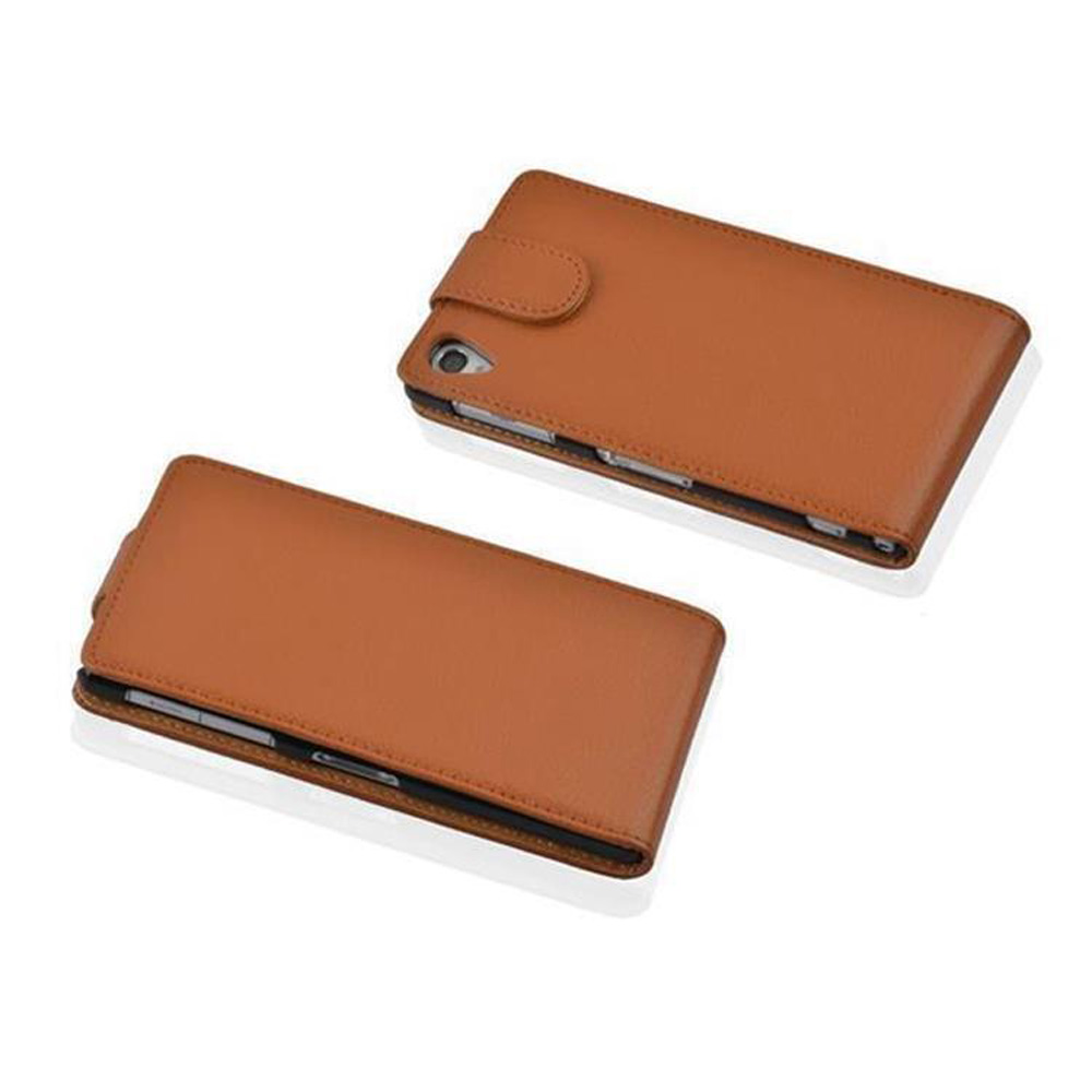 Dos teléfonos con fundas. Fundas de cuero marrón en posición cerrada.