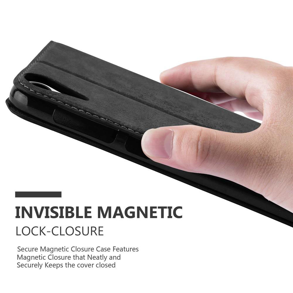 Custodia nera per telefono, mano che la tiene. Il testo dice 'Invisible Magnetic Lock-Closure'.
