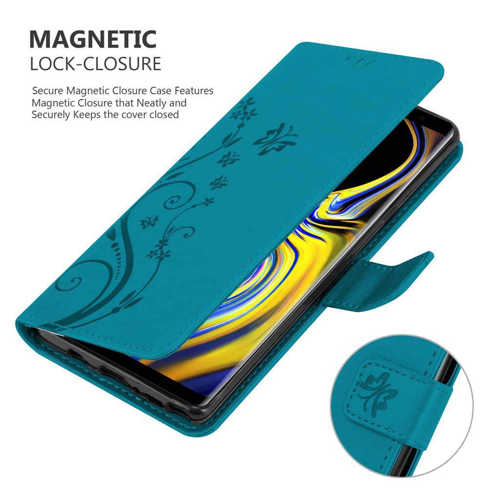 Türkisfarbene Handyhülle, offen. Blumendesign auf der Hülle. Ein Telefon befindet sich in der Hülle.