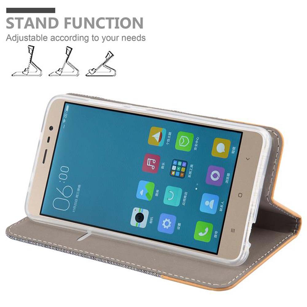 Telefon im Etui. Zeigt Symbole und Uhrzeit an. Das Etui ist offen, in Braun und Beige.