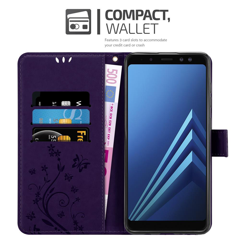 Telefono in una custodia a portafoglio viola con fessure per carte e denaro. Il telefono è in mostra.