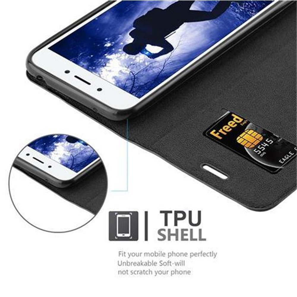 Un telefono in una custodia nera, aperto, con una carta di credito all'interno, che mostra lo schermo.