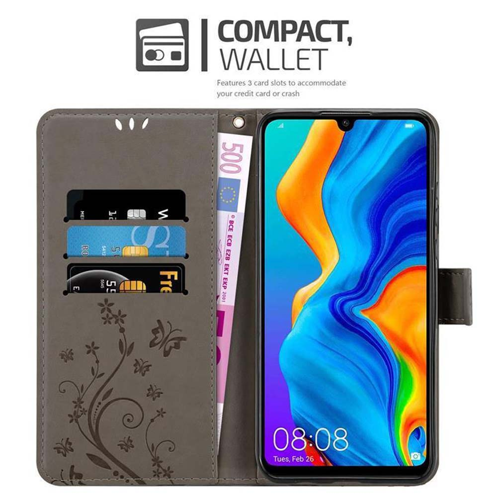 Telefono in una custodia a portafoglio con 3 fessure per carte, un vano porta soldi e una carta visibile. Il telefono mostra l'ora.
