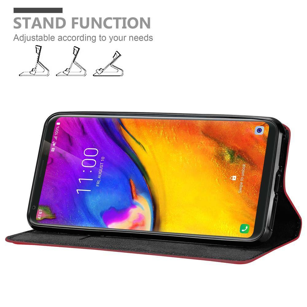 Telefono in una custodia, in piedi. Uno schermo mostra un display colorato con testo. Funzione supporto.