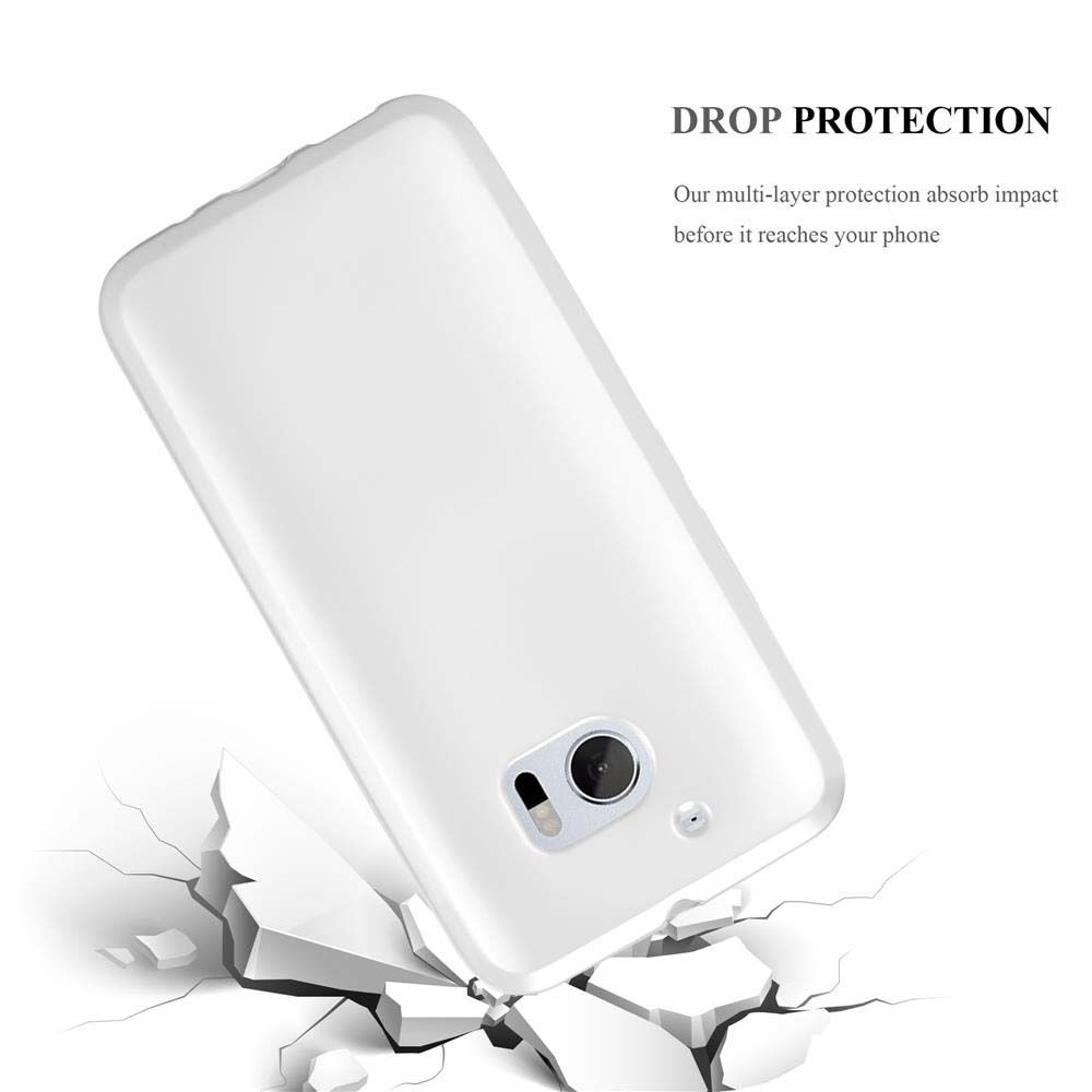 Weißes Telefon auf weißer Oberfläche. Die Oberfläche ist gerissen, als wäre das Telefon fallen gelassen worden.