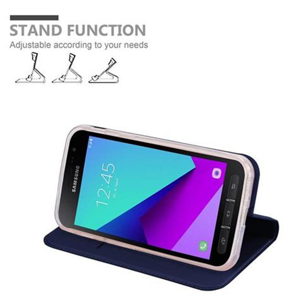 Telefono in una custodia con supporto blu. Testo: Funzione stand, regolabile in base alle tue esigenze.