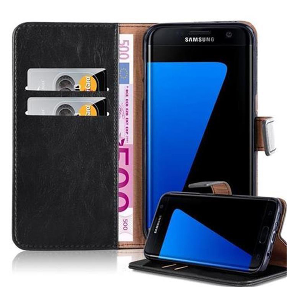 Teléfono con funda tipo cartera negra. Tarjetas y dinero dentro. Muestra la pantalla.