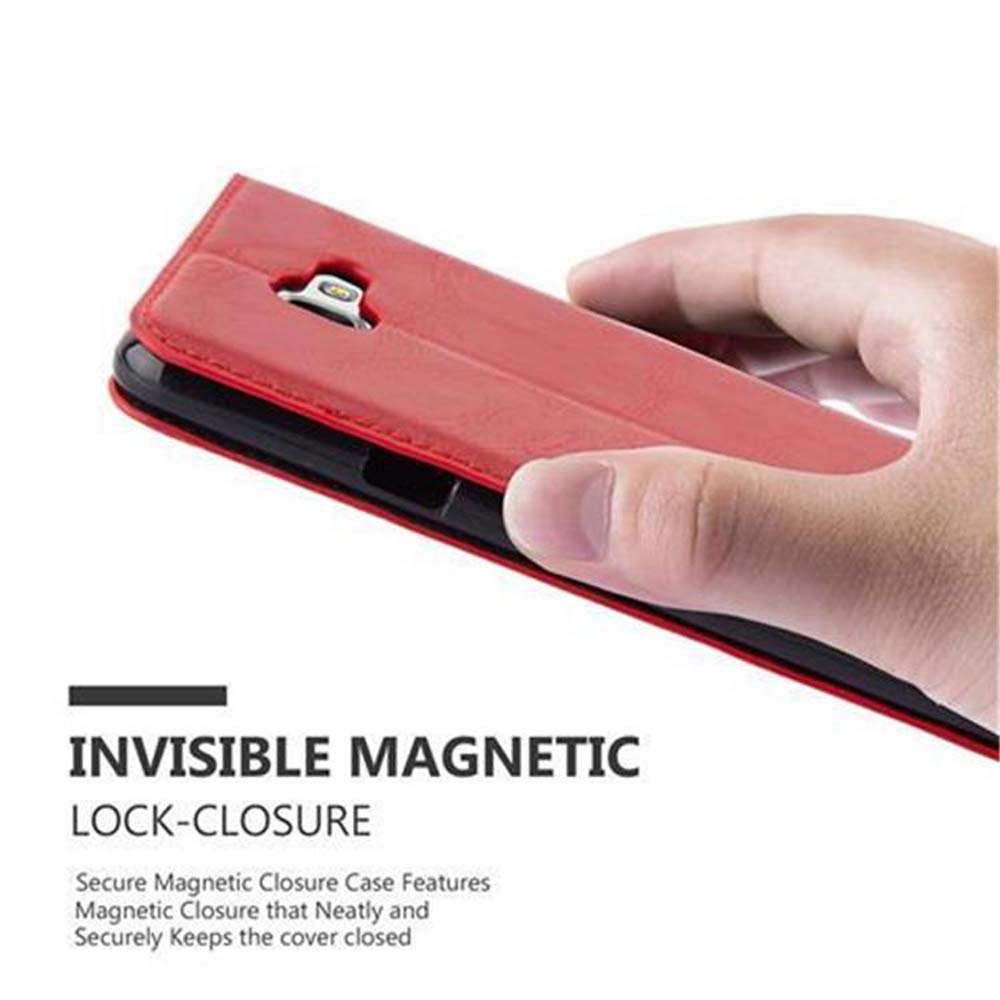 Eine Hand hält eine rote Handyhülle, die einen Magnetverschluss zeigt. Text: Unsichtbarer Magnetverschluss.