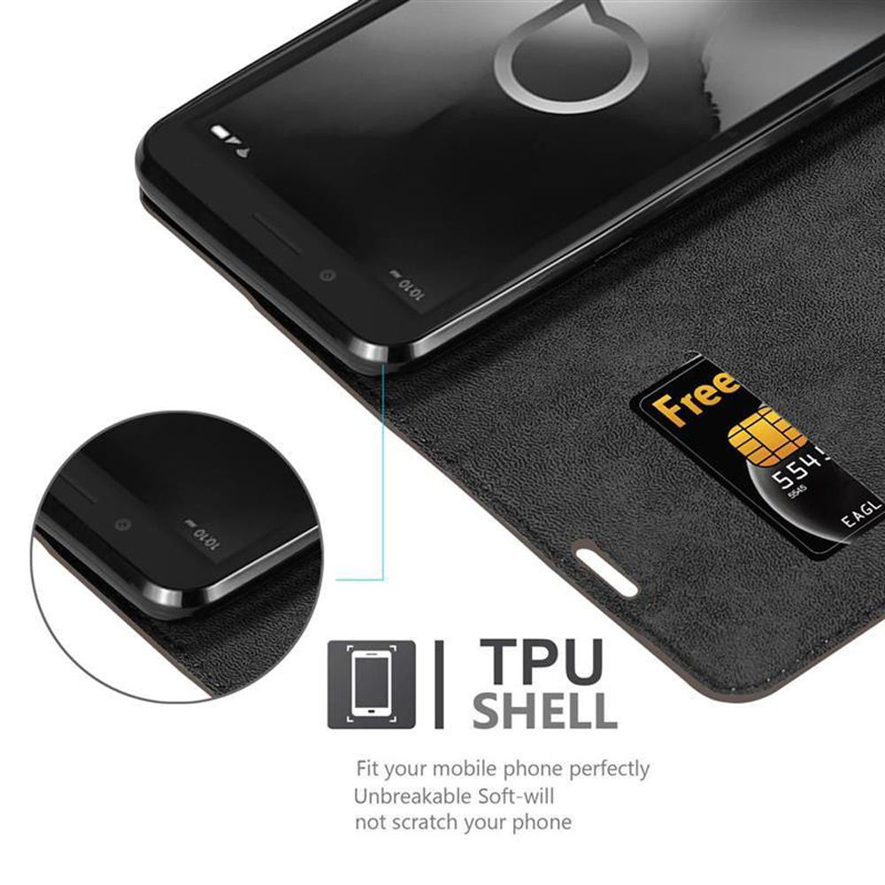 Telefon in geschlossenem Gehäuse. Text: TPU SHELL. Das Gehäuse ist schwarz, eine kleine Karte ist sichtbar.