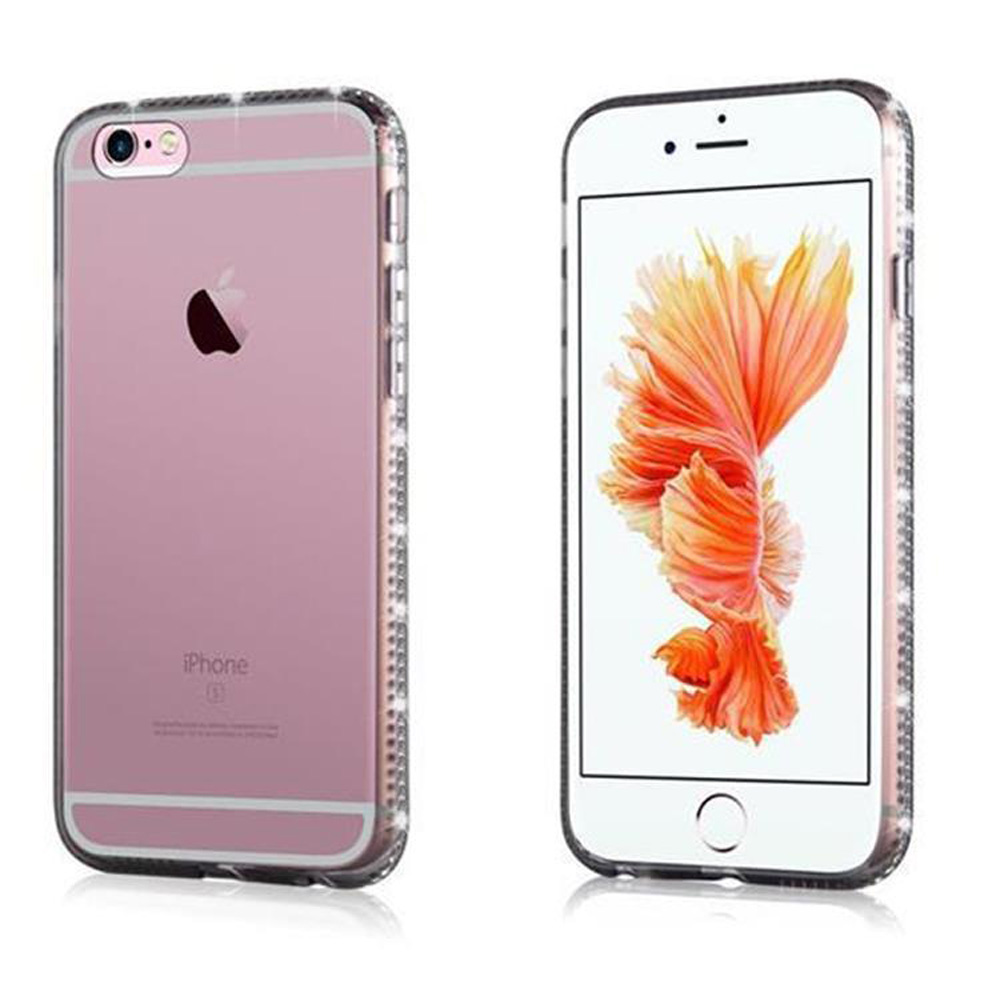 Zwei Telefone. Eins rosa mit Strasssteinen. Das andere hat einen weißen Bildschirm und Design.