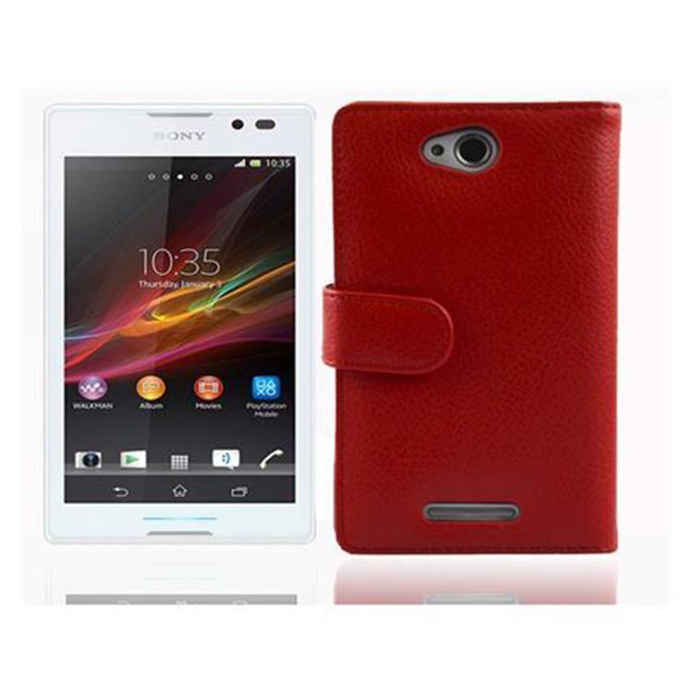 Weißes Telefon mit roter Lederhülle. Der Bildschirm zeigt Zeit und Symbole.