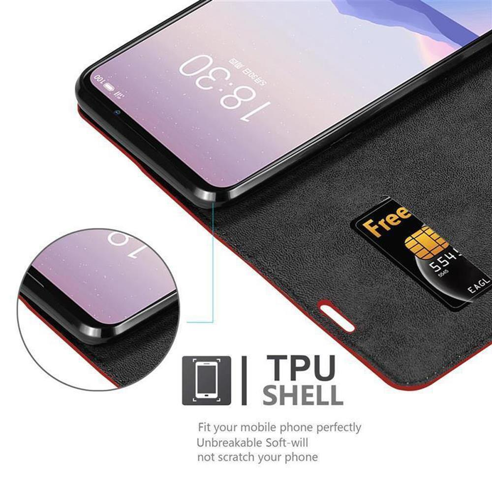 Funda de teléfono abierta, mostrando la pantalla del teléfono y la tarjeta SIM. La funda es negra y roja. Texto: TPU SHELL.