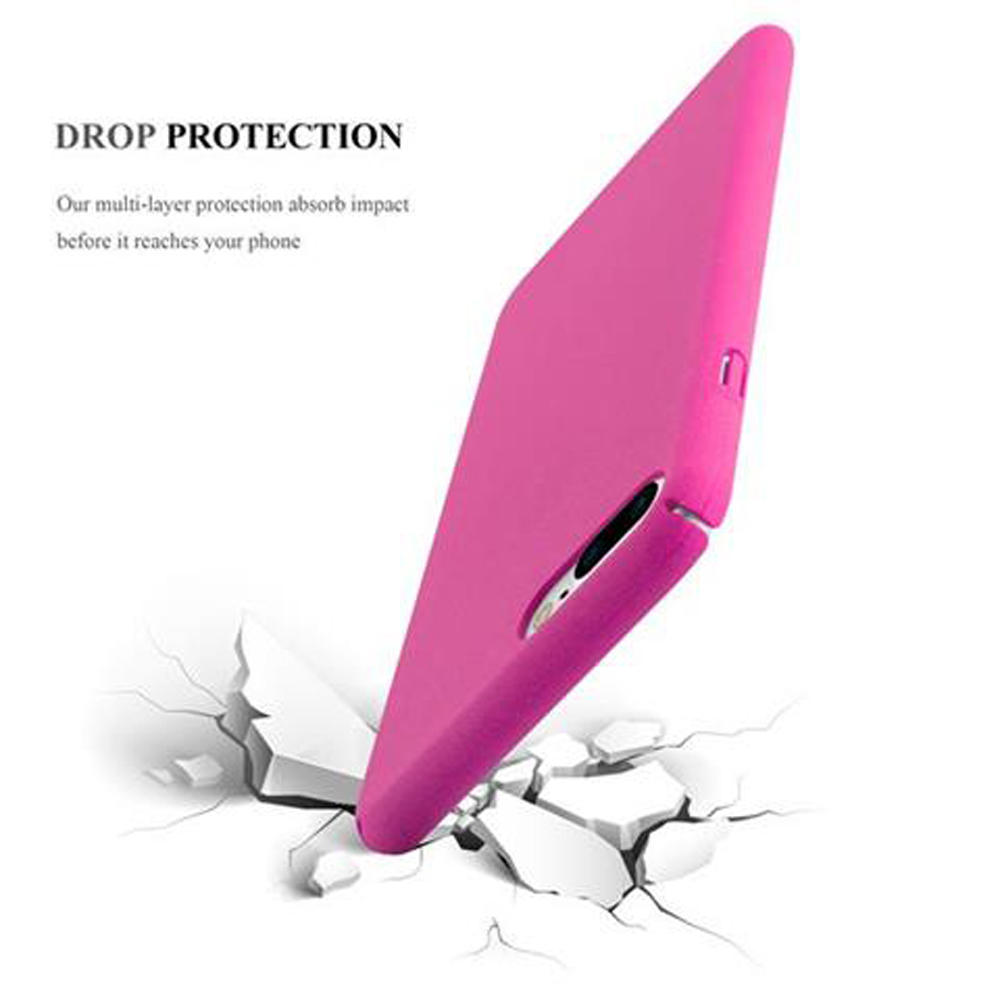 Custodia per telefono rosa, angolata, che incrina una superficie bianca. La custodia ha una superficie liscia.