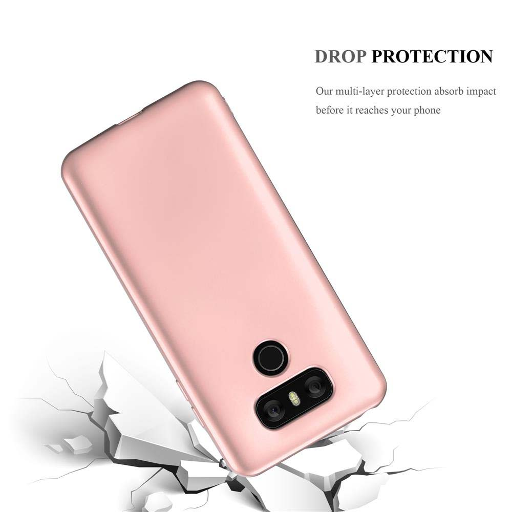 Custodia rosa per telefono, con forma di telefono, che cade su una superficie bianca incrinata.