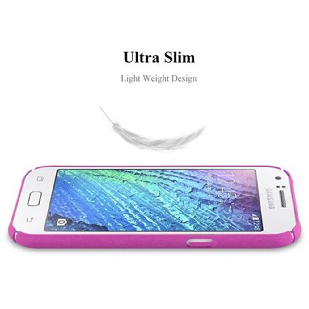 Un telefono rosa in una custodia rosa, visto di lato, con una piuma sopra.