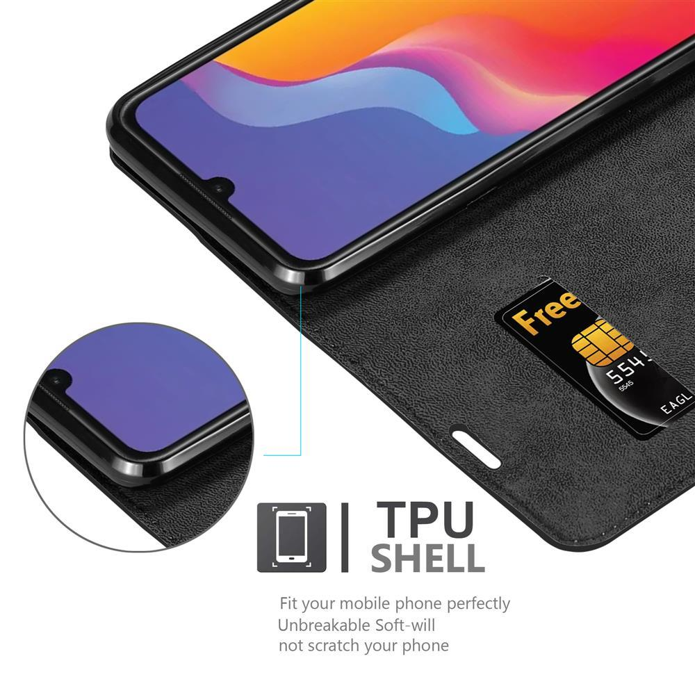 Schwarze Handyhülle mit Telefon und Karte. Das Telefon ist innen, die Hülle geöffnet.