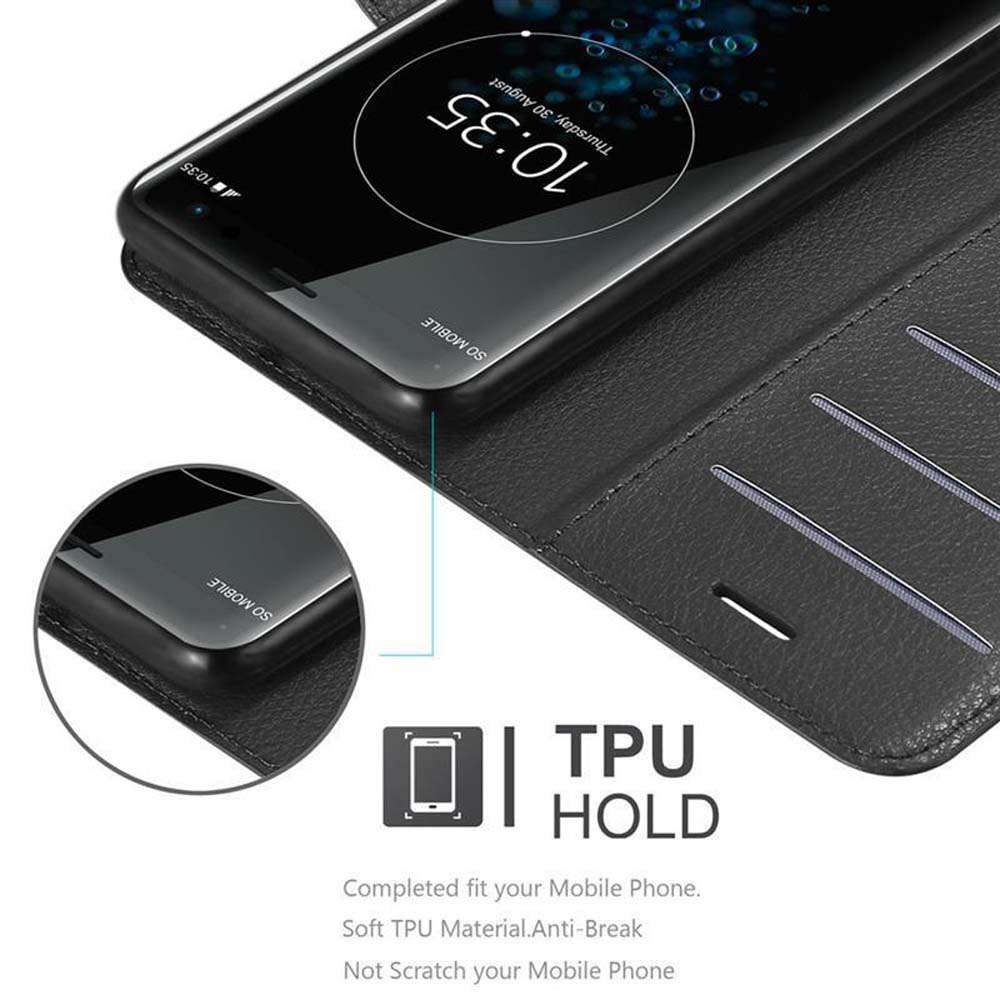 Custodia nera con telefono all'interno. Testo: TPU HOLD. Contiene uno slot per schede. Telefono nero.