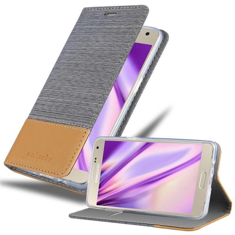 Dos teléfonos en fundas, uno abierto. Funda gris y marrón con un parche similar al cuero.