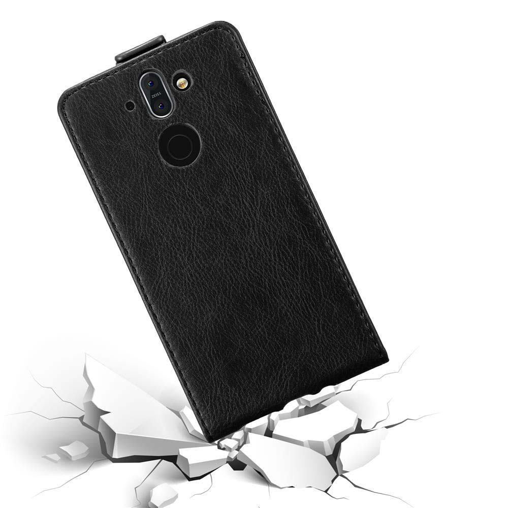 Eine schwarze Handyhülle scheint zu fallen und die Oberfläche, auf der sie sich befindet, zu zerbrechen.