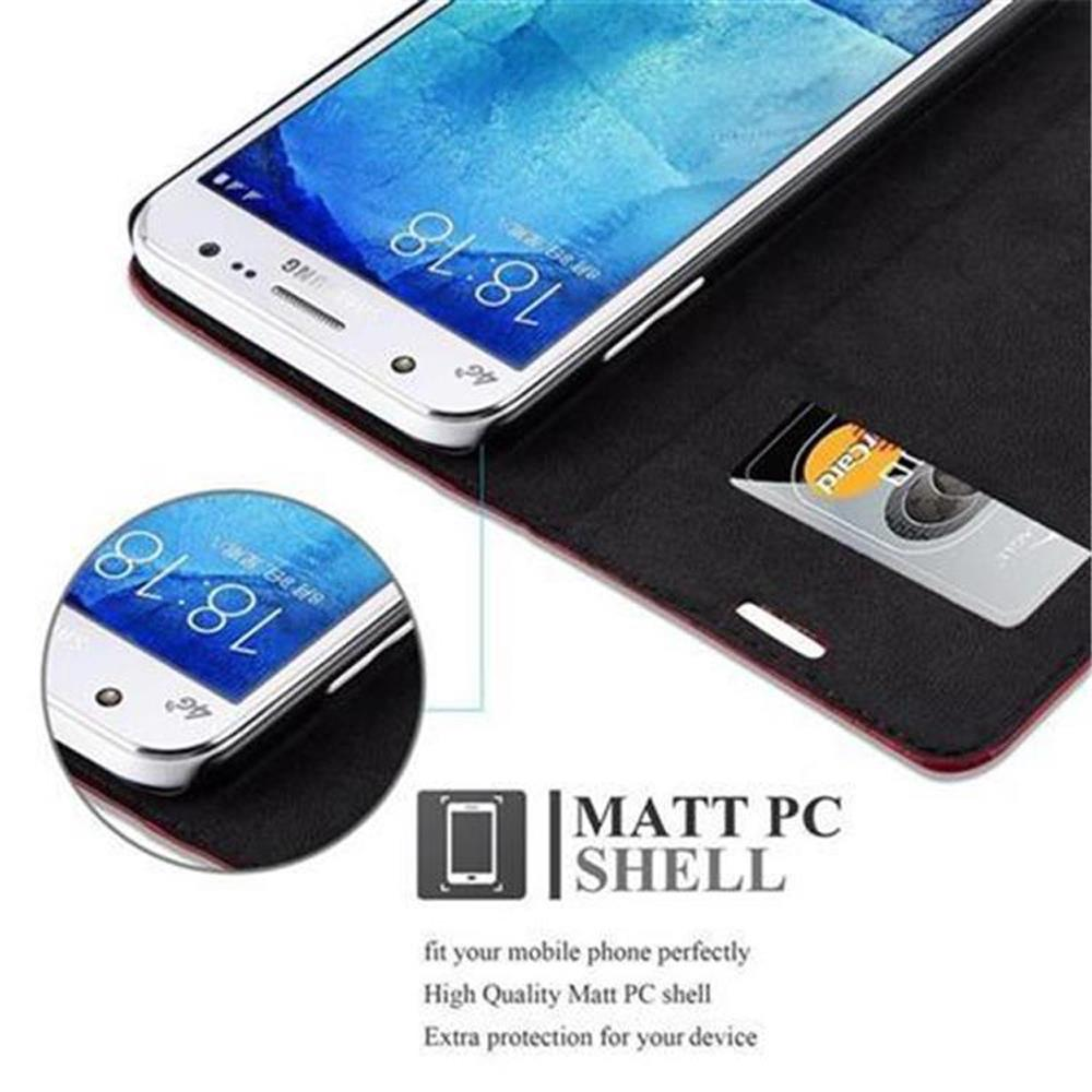 Telefon in einer Hülle, mit einem anderen Telefon daneben. Text: Matt PC Shell.
