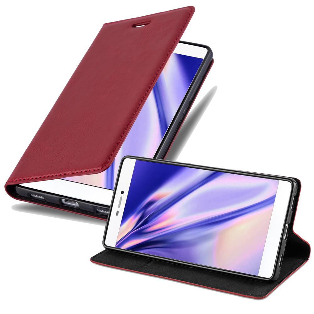 Dos teléfonos y una funda tipo cartera. La funda es marrón con ranuras para tarjetas. Los teléfonos muestran la hora.