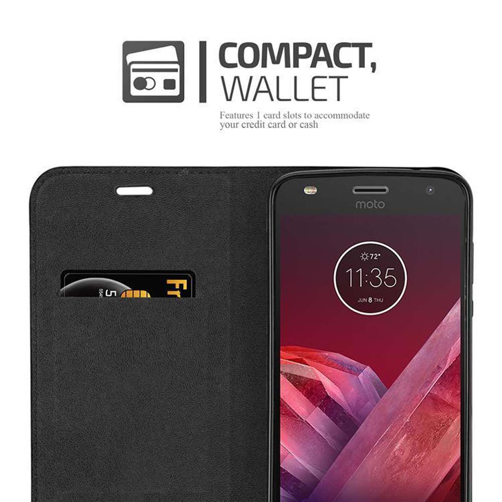 Custodia nera con telefono e slot per schede. Il telefono ha uno sfondo rosa.
