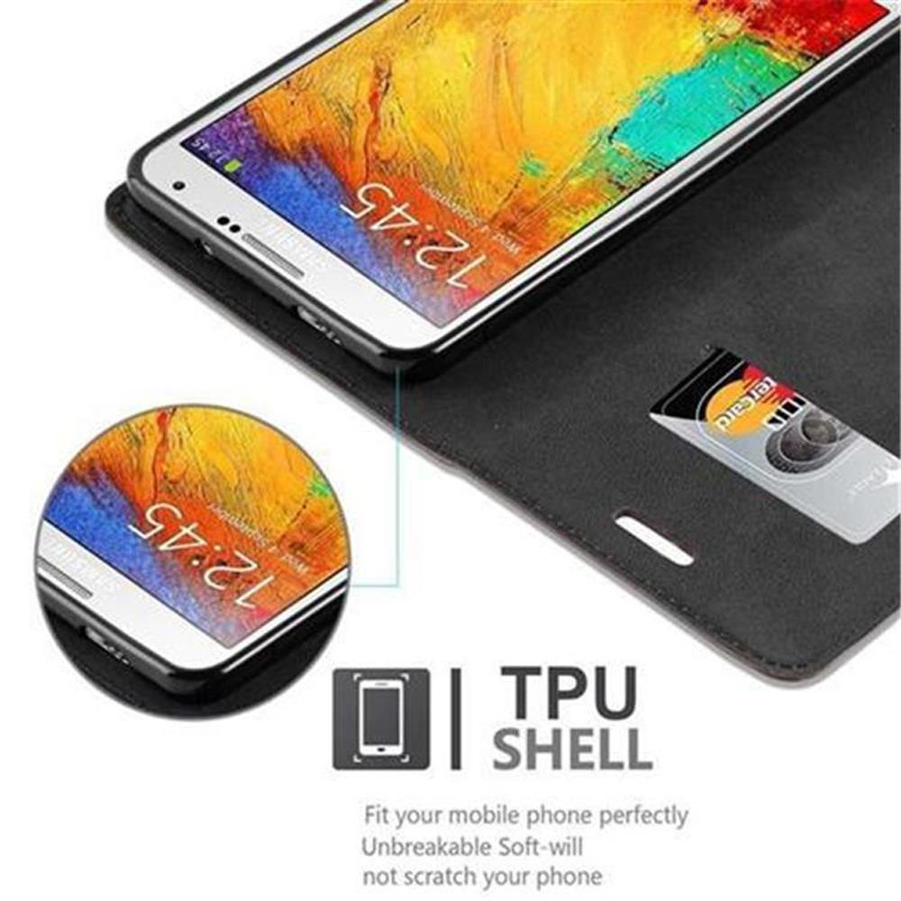 Un telefono dentro una custodia, con fessura per carte. Il telefono mostra l'ora. Testo: 'TPU SHELL'.