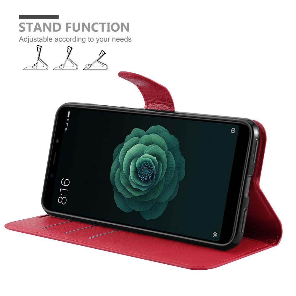 Rote Handyhülle mit Telefon, grünes Blumenbild auf dem Bildschirm. Standfunktion.
