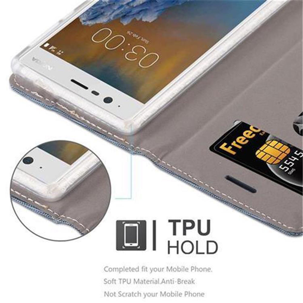 Telefono bianco in una custodia grigia con carta di credito. Il telefono mostra l'ora. Supporto TPU in basso.