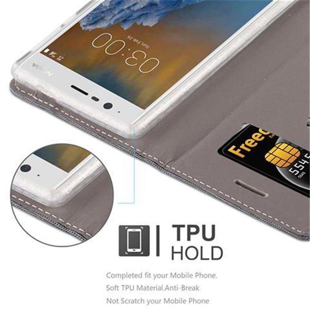 Ein Telefon in einem grauen Gehäuse mit einer eingelegten Kreditkarte. Eine Nahaufnahme des Telefons und des Gehäuses befindet sich in der Ecke.