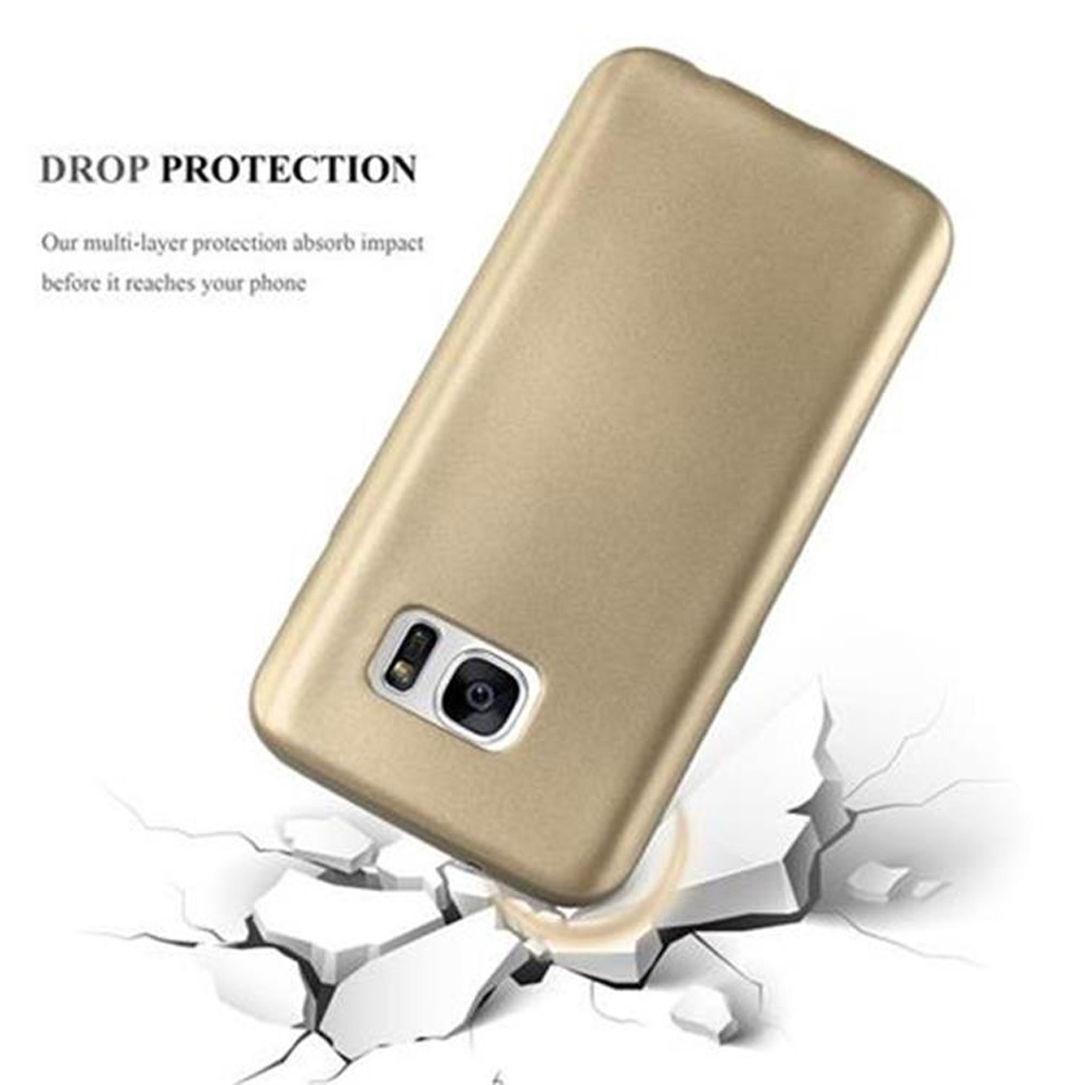 Funda de teléfono dorada apoyada en hormigón blanco roto. Texto: Protección contra caídas.
