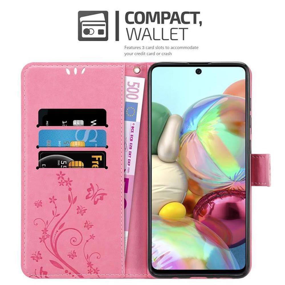 Custodia per telefono a portafoglio rosa con carte, denaro e un telefono. Dispone di scomparti per carte e design a farfalla.