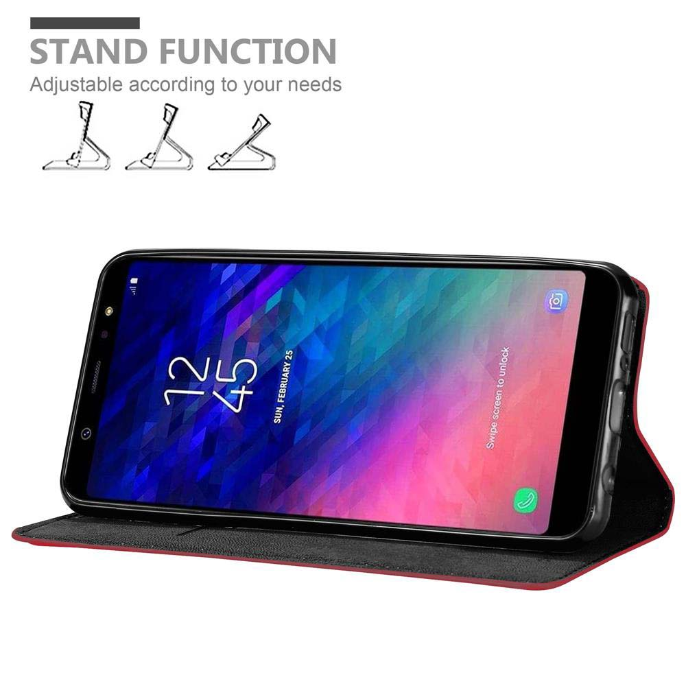 Schwarzes Telefon in roter Hülle, geöffnet, um den Bildschirm zu zeigen. Weißer Hintergrund, Ständerfunktion.