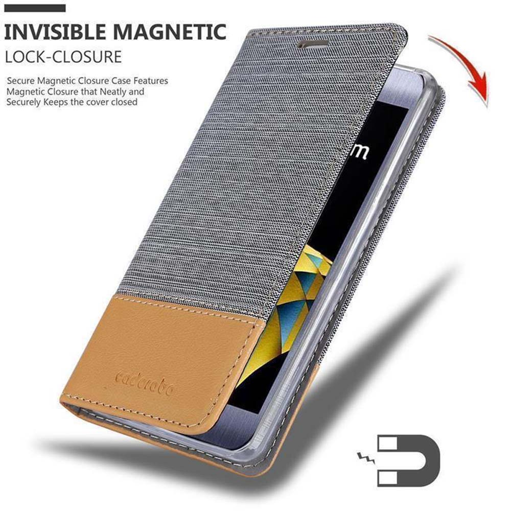 Funda de teléfono con un teléfono dentro. La funda está abierta, mostrando un cierre magnético y una textura de tela.